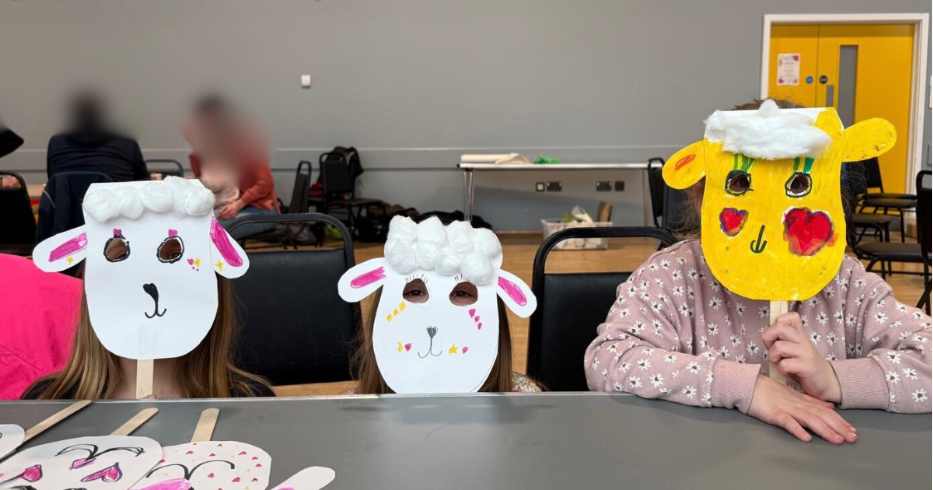 Children with masks on they made at Messy Church