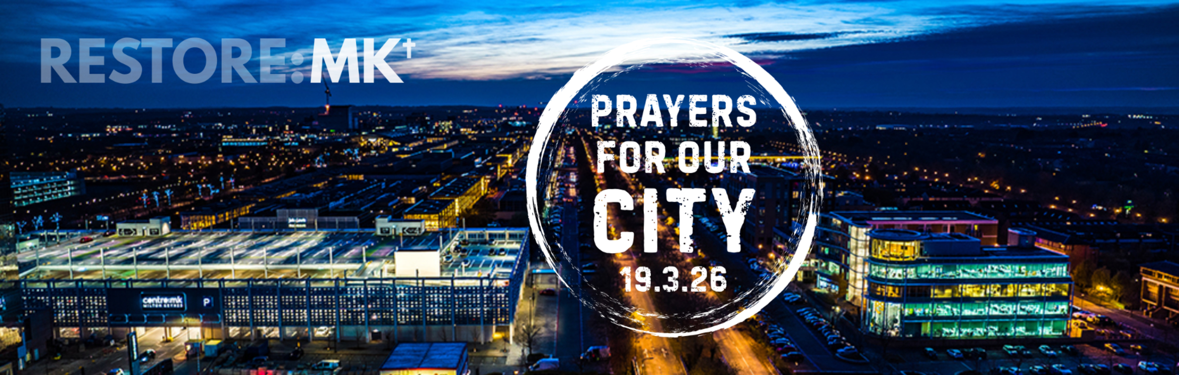 Night time image of city with words "restore MK, prayers for our city 19.3.26