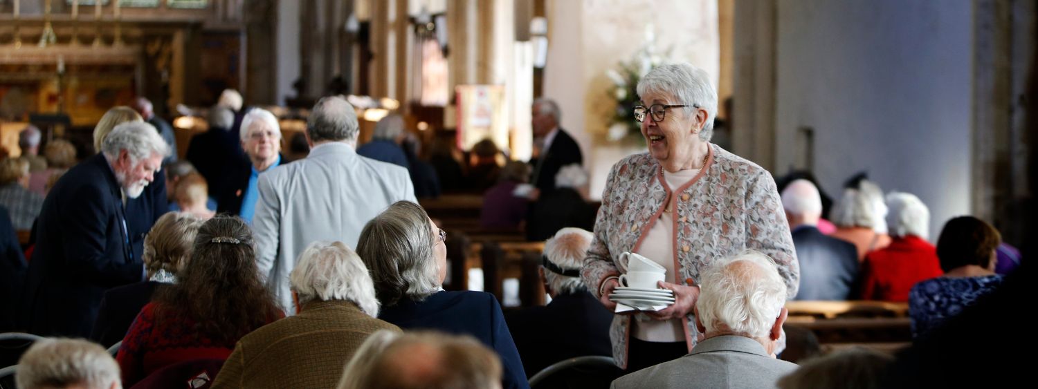 People enjoy tea in Dorchester Abbey