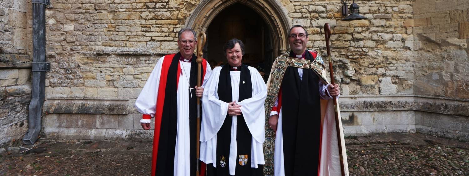 The Bishop of Oxford, Archdeacon Judy and Bishop of Dorchester standing outside Dorchester Abbey