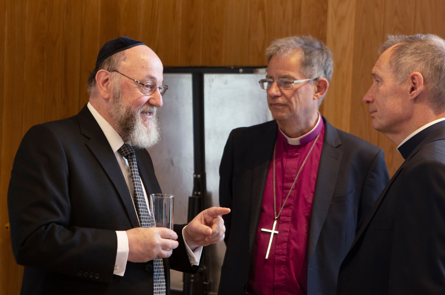 The Chief Rabbi, Bishop Steven and Archdeacon Jonathan chat over drinks